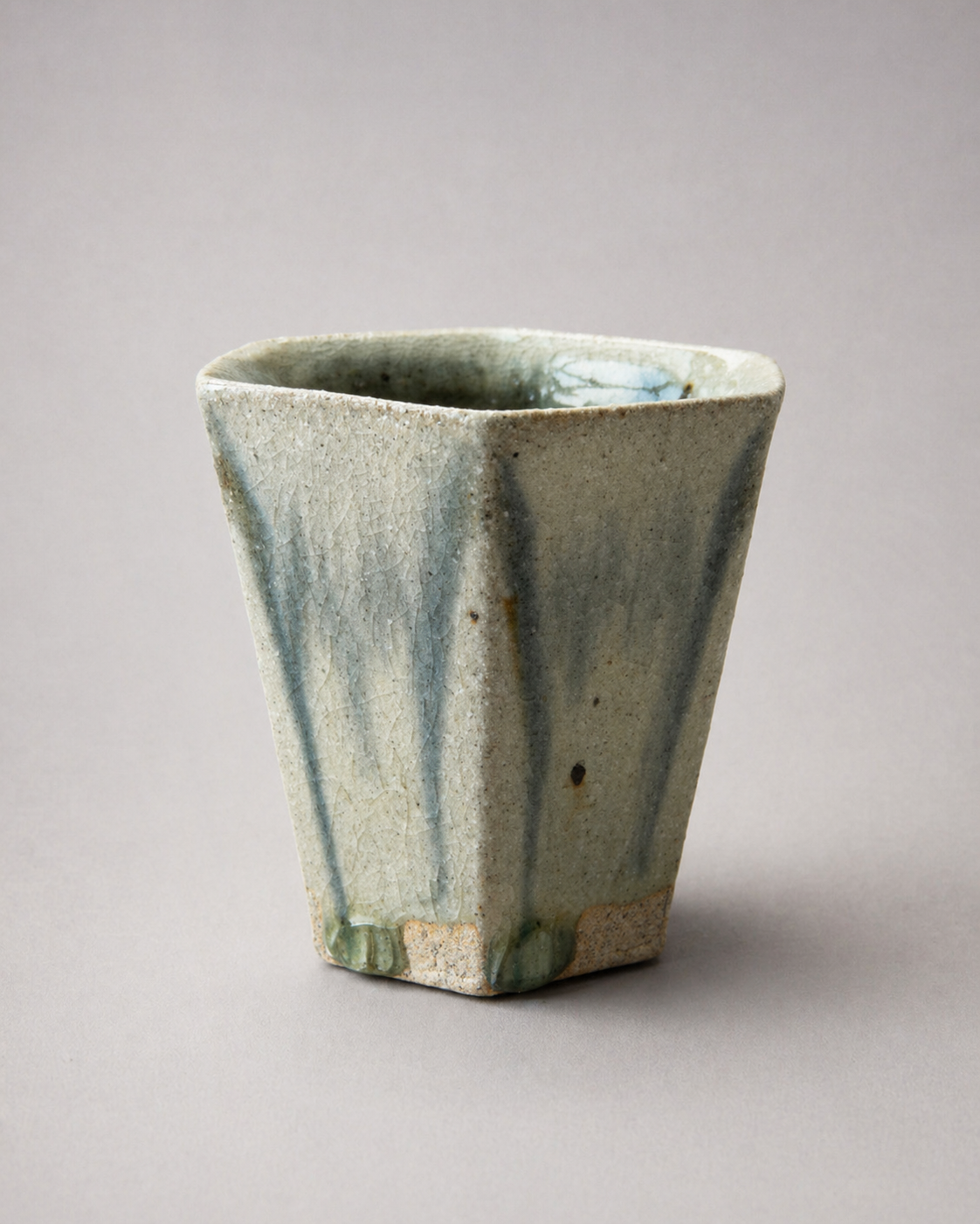 Kaku faceted yunomi cup in blue drip glaze